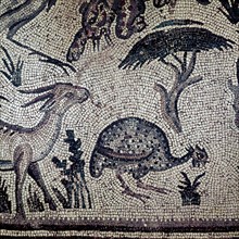 A detail of a mosaic from the Roman period in the Levant depicting a bird and a gazelle