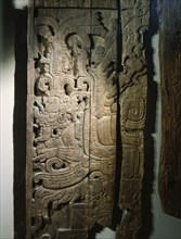 A detail of a carved wood lintel from Temple IV at Tikal, collected in 1877 by the explorer Gustav Bernoulli