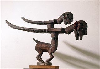 Chi Wara, depict a mythical hero, combining aspects of man and antelope who taught men to till the fields