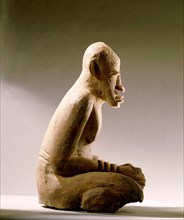 of a terracotta figure of a man excavated in the Djenne/Mopti area