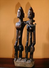 A Dogon sculpture of a couple, probably used as a prestige display at the funeral of a wealthy man