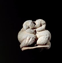 Fat Lady figurine, one of the 30 seated or squating figurines which comprise the Hagar Qim Group