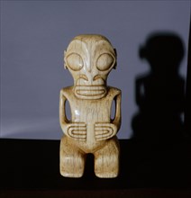 Small ivory tiki figure, probably a pendant