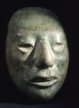 Jade portrait head inscribed with glyphs on reverse