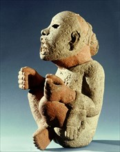 Xipe Totec, the Flayed Lord, dressed in the skin of a sacrificial victim