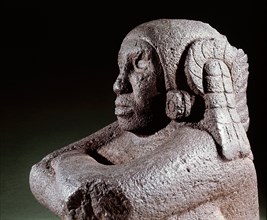 Seated figure of Xochipilli, the Aztec god of music and dance