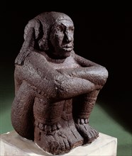 Seated figure of Xochipilli, the Aztec god of music and dance