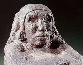 Seated figure of Xochipilli, the Aztec god of music and dance