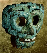 Turquoise and shell encrusted mask of Quetzalcoatl, the Feathered Serpent