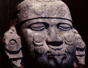 Colossal stone head of Coyolxauhqui, the Moon Goddess who was beheaded by her brother the Sun
