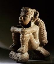 Tonatiuh, the sun god, with a symbol representing an earthquake on his back