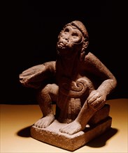 The monkey, Ozomatli, servant of Xochipilli
