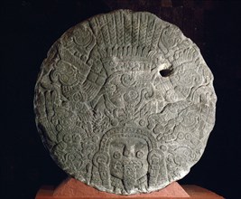 Relief with Tonatiuh, the Sun god, shown as a diving eagle surrounded by skulls