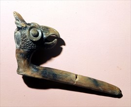 Pipe with the eagle head symbol of the sun god