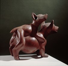 Colima pottery figure of a pair of dogs copulating