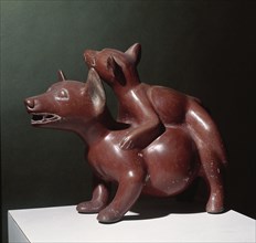 Colima pottery figure of a pair of dogs copulating