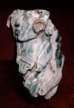 Jade carving with human head