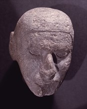 Aztec stone male head