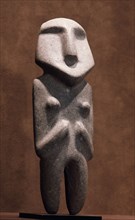 Schematic stone figure