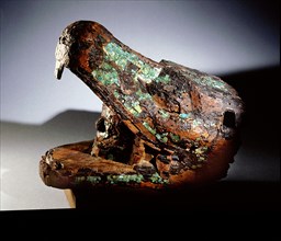 Turquoise mosaic encrusted wood mask of Quetzalcoatl, the Feathered Serpent, rising from the jaws of the earth represented in the earth deitys guise of a coyote