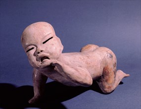 Figure of a crawling baby