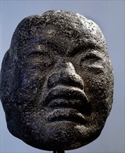Head, possibly representing a jaguar spirit