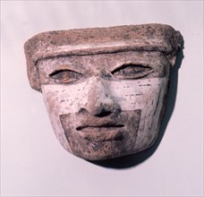 A ritual mask or possibly part of an incense burner