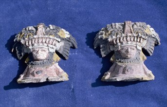 Two miniature painted heads from a unique Classic Teotihuacan burial cache