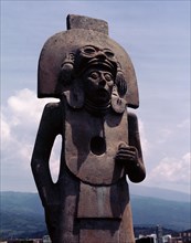 Large stone carved figure