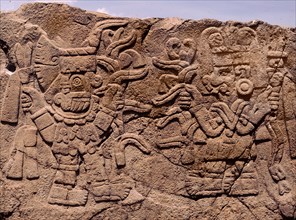 Relief showing Tlaloc, the rain god bringing blessings to the maize goddess