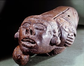 Teponaztli   two toned drum   in the form of a bound captive, probably a sacrificial victim