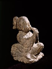 Tomb figure of a seated female musician