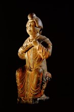 Tomb figure of a seated female musician