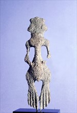 Carving of a human figure or otter