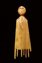 Comb in the shape of a stylized figure