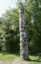 Totem pole with ceremonial crests