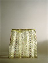 Storage bag made from strips of walrus intestine decorated with coloured pieces of cloth obtained from Russian traders