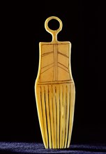 Ivory comb in shape of a stylised human figure