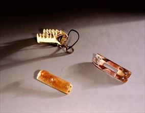 Bone crampons which were lashed to boots to improve traction