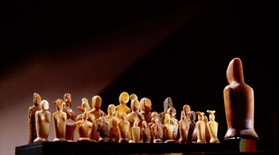 A collection of sea mammal ivory figurines