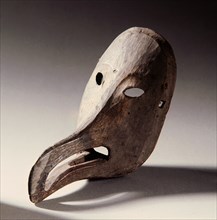 A stylized mask representing Raven, the spirit of the raven species