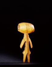 Ivory bead or pendant or toggle carved in semi human form