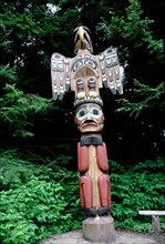 Totem pole with eagle and human crests