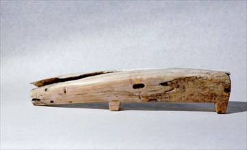 Bone handled knife in the shape of a polar bear, with an incised whale