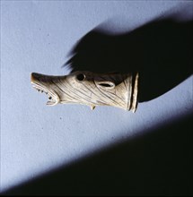 Ivory animal head, possibly representing a wolf