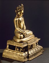 A figure of a seated Buddha