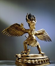 Garuda   golden winged eagle of wisdom and enemy of the Nagas (serpents)