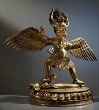 Garuda, golden winged eagle of wisdom and enemy of the Nagas (serpents)