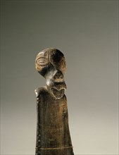 The archaic style of the carved head on this digging stick from the Mahurangi region, just north of Auckland, suggests that it dates from as early as the C16th