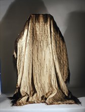 Mans cloak known as korowai, made by finger weaving of fine flax fibres and decorated with black dyed lengths of rolled fibres